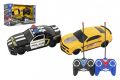 Auto RC 2ks policejní honička plast žluté 18cm na dálk. ovl. na bat. se světlem v krabici 36x22x12